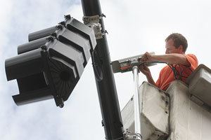 Worker working on Traffic Light